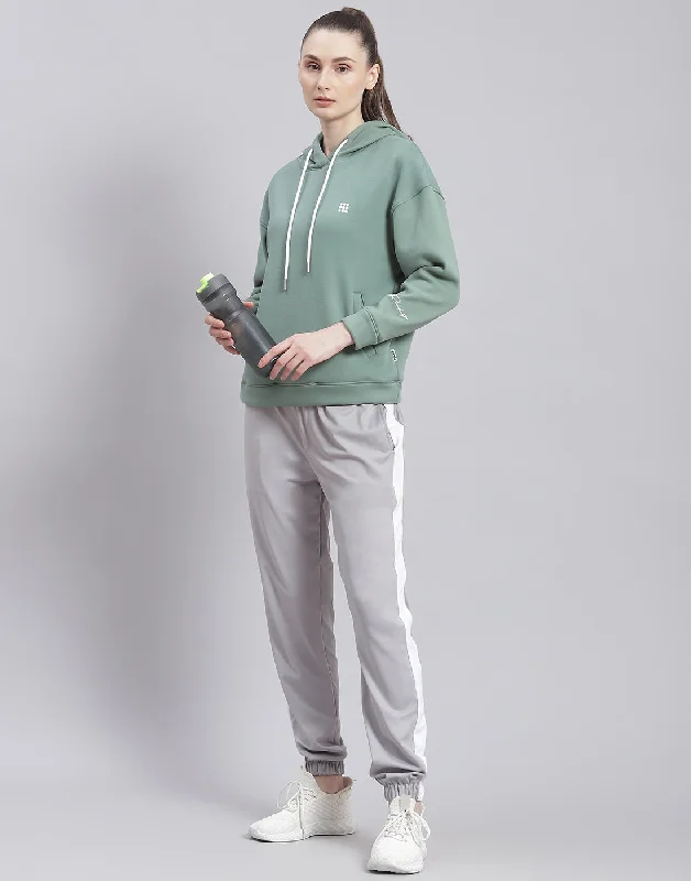 Women Green Solid Hooded Full Sleeve Sweatshirt