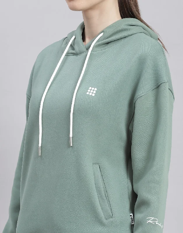 Women Green Solid Hooded Full Sleeve Sweatshirt