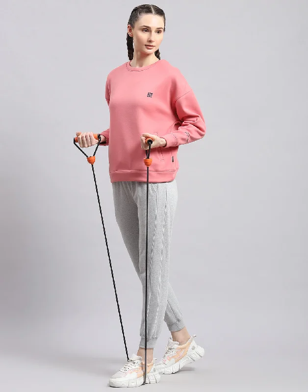 Women Pink Solid Round Neck Full Sleeve Sweatshirt